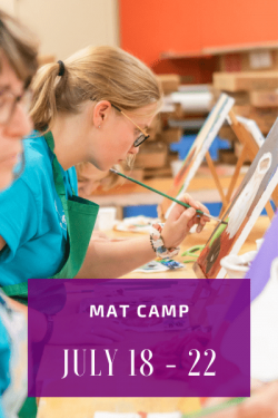 MAT Camp July 18 - 22, 2022. Image of a girl in a aqua t-shirt painting a small canvas on a table top easel.
